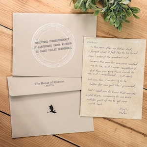 Carta y sobre de correspondencia recuperada de Xaden Riorson a Violet Sorrengail