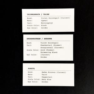 May include: A black and white image with three cards listing the names, bonds, mates, tails, scale colors, and eye colors of three dragons. The names are Tairneanach, Andarnaurram, and Sgaeyl.