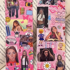May include: Two pink bookmarks decorated with images of celebrities, stickers, and text. One bookmark features a photo of Britney Spears blowing a bubble, and the other has the text "NOW THAT'S WHAT I CALL MUSIC".