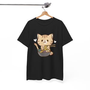 Cute Anime Cat Eating Ramen Unisex Heavy Cotton Tee, Kawaii Graphic Tee, Japanese Noodle Lover Shirt, Cartoon Kitty Ramen T-Shirt, Funny Pet