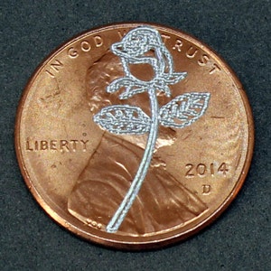 Lucky penny with engraved rose