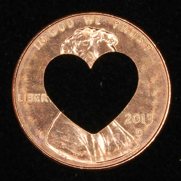 Lucky penny with heart cut out