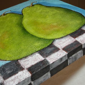 May include: A still-life painting featuring two green pears with textured surfaces, set against a light blue background and a black and white checkered pattern. The pears are the focal point, with a detailed, realistic depiction.