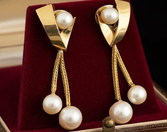 Vintage 14 kt gouden pareloorbellen – Frans zwaankeurmerk, achterkant Omega