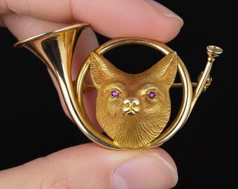 Antieke 14 kt gouden vosbroche: robijnrode ogen, jachthoorn, reversspeld