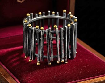 Vintage ring van geoxideerd zilver en 18-karaats goud, Aaron Faber Picket Fence Band