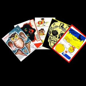 May include: A set of five Halloween-themed paper crafts. The crafts include a jumping owl, a tongue twister, a skull, a Halloween party invitation, and a "Hey Look!" card with a black cat.