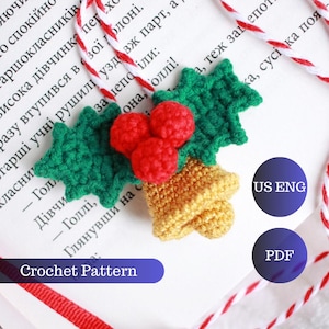 May include: Crochet pattern for a Christmas bell ornament with holly leaves and red berries. The pattern is available in US English and PDF format.