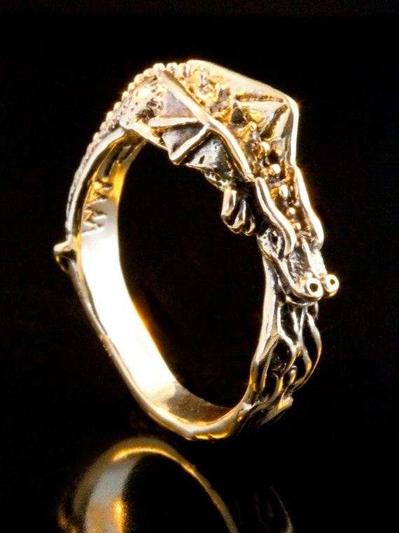 Buy Gold Plated Metal Carved Ring by Masaba Online at Aza Fashions.