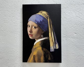 May include: A painting of a woman with a blue and yellow headscarf and a pearl earring. She is wearing a yellow and brown dress and looking to the left.