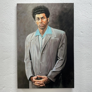 May include: A painting of a man with dark curly hair wearing a light gray suit jacket over a light blue shirt. The man is looking at the viewer with a serious expression.