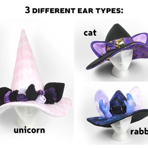 May include: Three witch hats with different ear types: a pink hat with unicorn ears, a black hat with cat ears, and a blue hat with rabbit ears. The hats are all on mannequin heads.