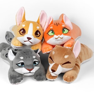 May include: Four plush animal toys in a stack. The top toy is a yellow and white corgi with brown eyes and pink ears. Below it is an orange cat with green eyes. The bottom two are a gray leopard and a tan lion.