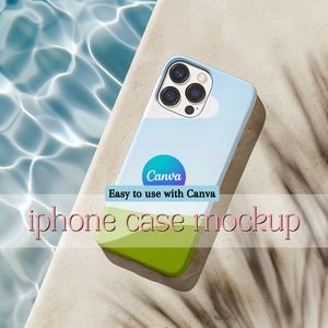 May include: A blue and green iPhone case mockup with a white camera lens and the text "Canva Easy to use with Canva" on a sandy surface.