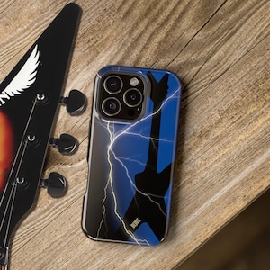 May include: A black and blue phone case with a guitar silhouette and lightning bolt design. The case is on a wooden surface next to a black guitar headstock. The word "DIME" is printed on the case.