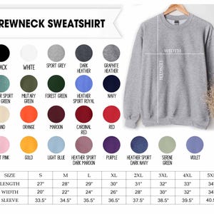 May include: A grey crewneck sweatshirt displayed with a color chart featuring twenty-five circular swatches in various colors including black, white, green, red, and blue, alongside a size chart with length, width, and sleeve measurements in inches.