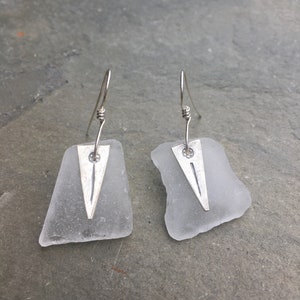 white sea glass earrings with Hill's Tribe charm image 4