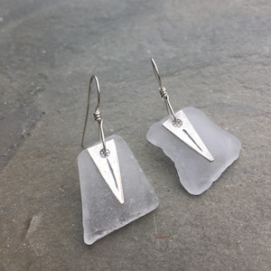 white sea glass earrings with Hill's Tribe charm image 1