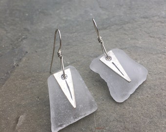 white sea glass earrings with Hill's Tribe charm