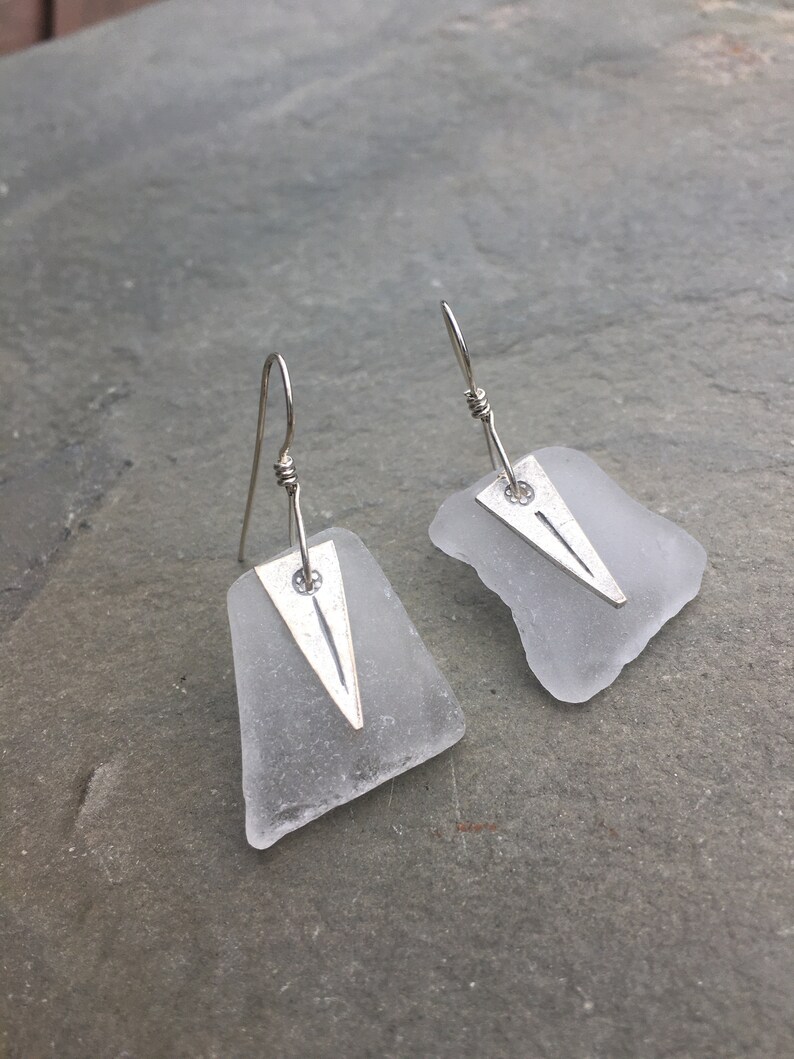 white sea glass earrings with Hill's Tribe charm image 1