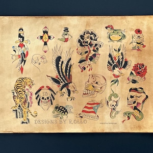 May include: A vintage-style tattoo flash sheet featuring various traditional tattoo designs. The sheet includes images of a tiger, eagles, skulls, roses, a frog, a snake, and other classic tattoo motifs. The words "DESIGNS BY ROLLO" are visible.