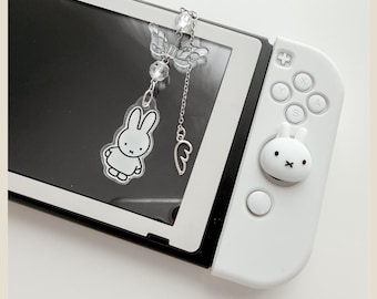 white angel bunny dust plug charm | switch | handhelds | coquette | phone jack