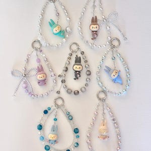 Labubu pop beans keychain | phone strap| bag charm |mini version Labubu Lazy Yoga