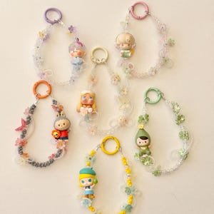 Going Outing With Me pop bean keychain| Authentic POPMART pop beans | Flower beads phone charm|purse charm | Crybaby | Molly| Dimmo | Labubu
