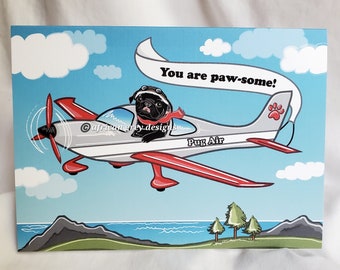 May include: A cartoon pug wearing aviator goggles and a red scarf is flying a small airplane with the words "Pug Air" on the side. The plane is flying over a blue ocean and green hills. A banner behind the plane reads "You are paw-some!"
