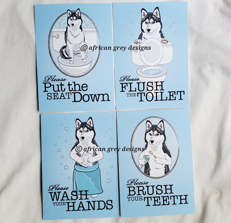 May include: Four blue cards with a cartoon husky dog on each. The cards have text that reads "Please Put the Seat Down", "Please Flush the Toilet", "Please Wash Your Hands", and "Please Brush Your Teeth".