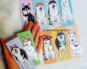 May include: Set of 10 colorful bookmarks featuring different illustrations of Siberian Huskies. Each bookmark is approximately 4 inches tall and 1.5 inches wide. The bookmarks are printed on high-quality cardstock and are perfect for dog lovers.