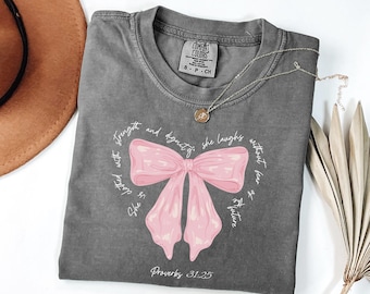 Comfort Colors® She Is Clothed With Strength Proverbs 31:25 Coquette, Bible Verse Shirt For Her, Cute Christian Gift, Coquette Mommy, M2260