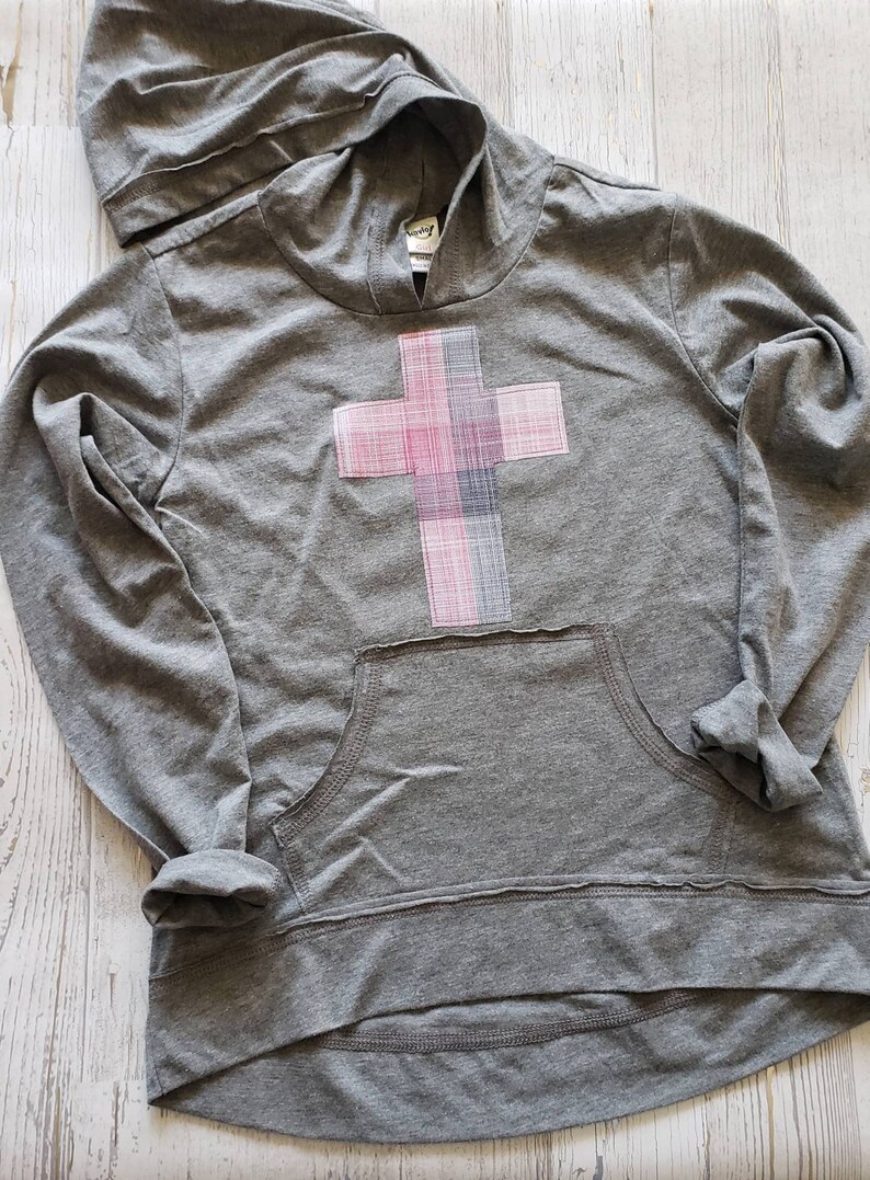 shirt with cross on it