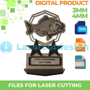 May include: A laser cut trophy design featuring a fish with a star-shaped base. The trophy has a space for engraving text. The design is available in SVG, AI, and DXF file formats for laser cutting. The files are for 3mm or 4mm material.