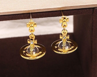 Pendientes de anime Nana Saturn, pendientes colgantes con orbe de Saturno, joyería gótica Y2K para cosplay de manga, regalo para fans otaku, accesorios punk alternativos.
