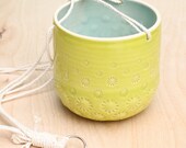 lime green hanging planter with cotton cord hanging plant container