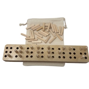 May include: A wooden pegboard with multiple holes and pegs, accompanied by a small canvas bag filled with additional wooden pegs. The pegboard is rectangular and has a natural wood finish.