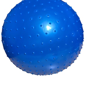 May include: A bright blue exercise ball featuring a textured surface with small, rounded bumps. The ball is a solid colour and appears inflated, suitable for fitness activities. The image is set against a plain white background.