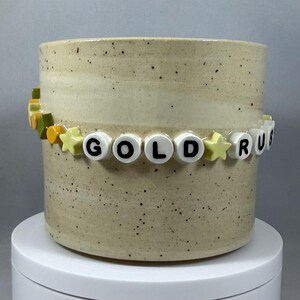 Ruée vers l'or / Evermore - Tasse en céramique faite main avec bracelet d'amitié Taylor Swift