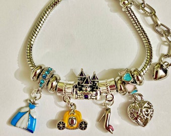 Disney inspired Cinderella charm bracelet for girls, castle, shoe, gown and pumpkin carriage charms.