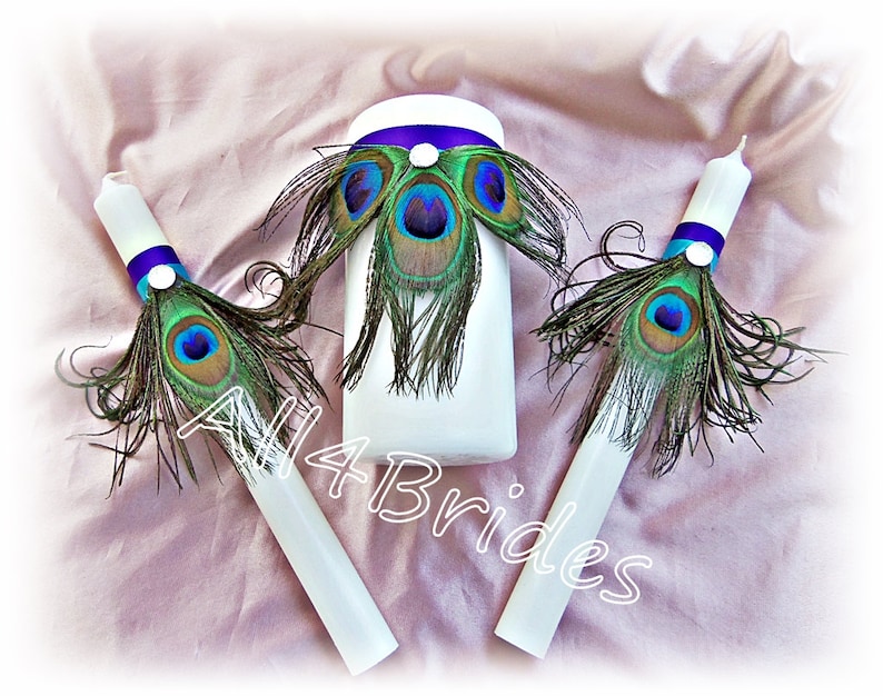 Peacock weddings guest book and pen set purple and turquoise peacock feather wedding decorations.