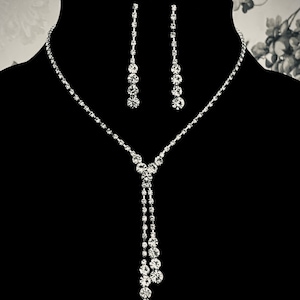 Sparkly crystals lariat necklace and earrings set.