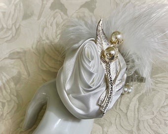 Bridal wrist corsage, white satin rose flower and ostrich feathers corsage.