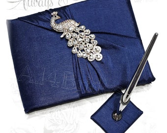 Navy blue peacock wedding guest book and pen set with crystal peacock brooch