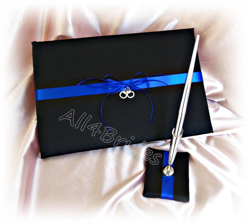 handcuff charms bridal garter set and money dance bag. Thin blue police wedding leg garter set and drawstring bag