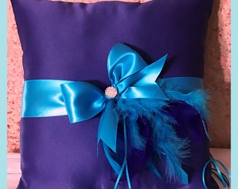 Turquoise and purple wedding ring pillow pillow.