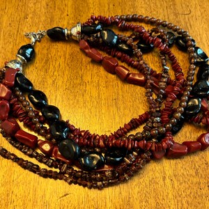 Beautiful vintage red, brown and black beaded necklace