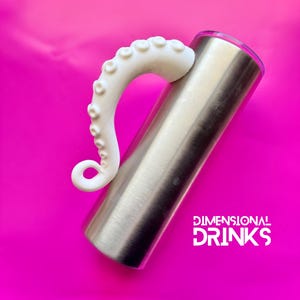 May include: A stainless steel tumbler with a white octopus tentacle handle. The tumbler has the text "DIMENSIONAL DRINKS" in white on a bright pink background.