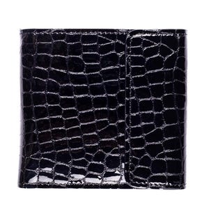 A black, glossy wallet with a crocodile skin texture. The wallet is rectangular with a flap closure on the right side. The surface reflects light, highlighting the embossed pattern.