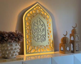 Wooden Mehrab with writing “Ramadan Mubarak” . With light